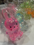 Pink glitter bunny-shaped squishy toy