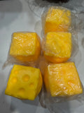 Medium yellow cheese-shaped squishy toy