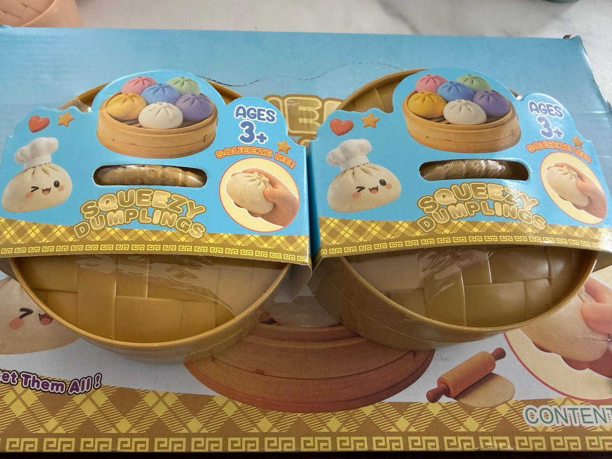 Pastel mystery dumpling squishies in steamer containers