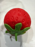 Red strawberry squishy with green leafy top